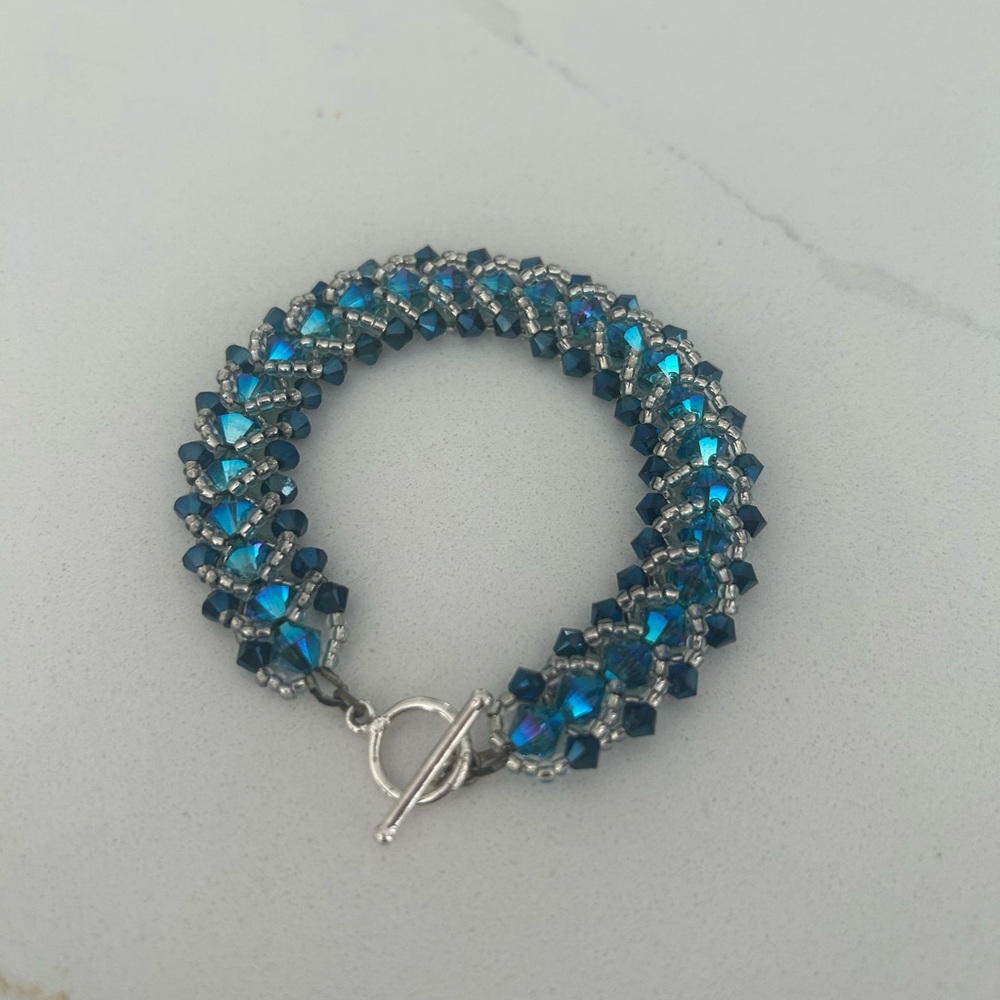Intricate Blue and Silver Beaded Bracelet with Toggle Clasp